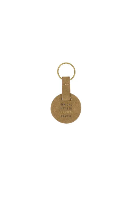 Zusss ronde sleutelhanger gouden randje bruin