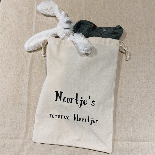 Reserve kleertjes zakje met naam
