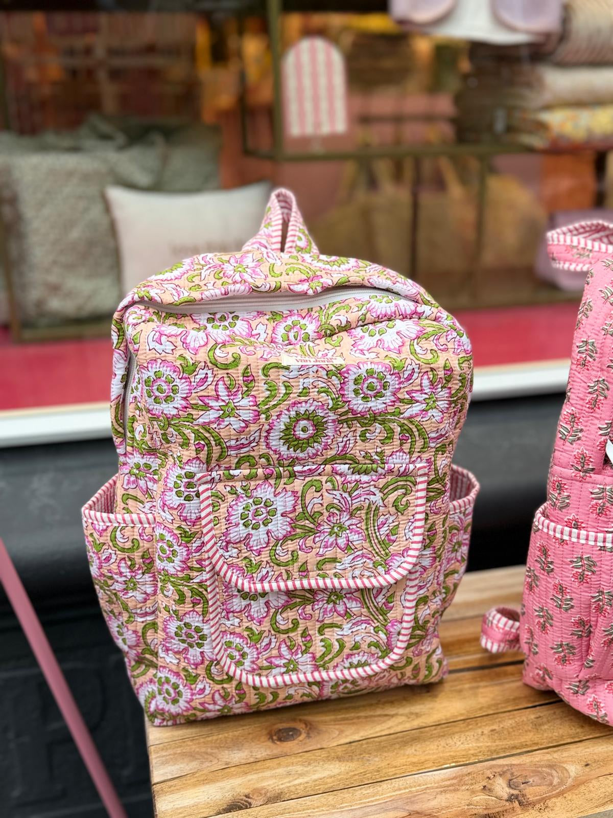 Rugtas roze bloemen met groen