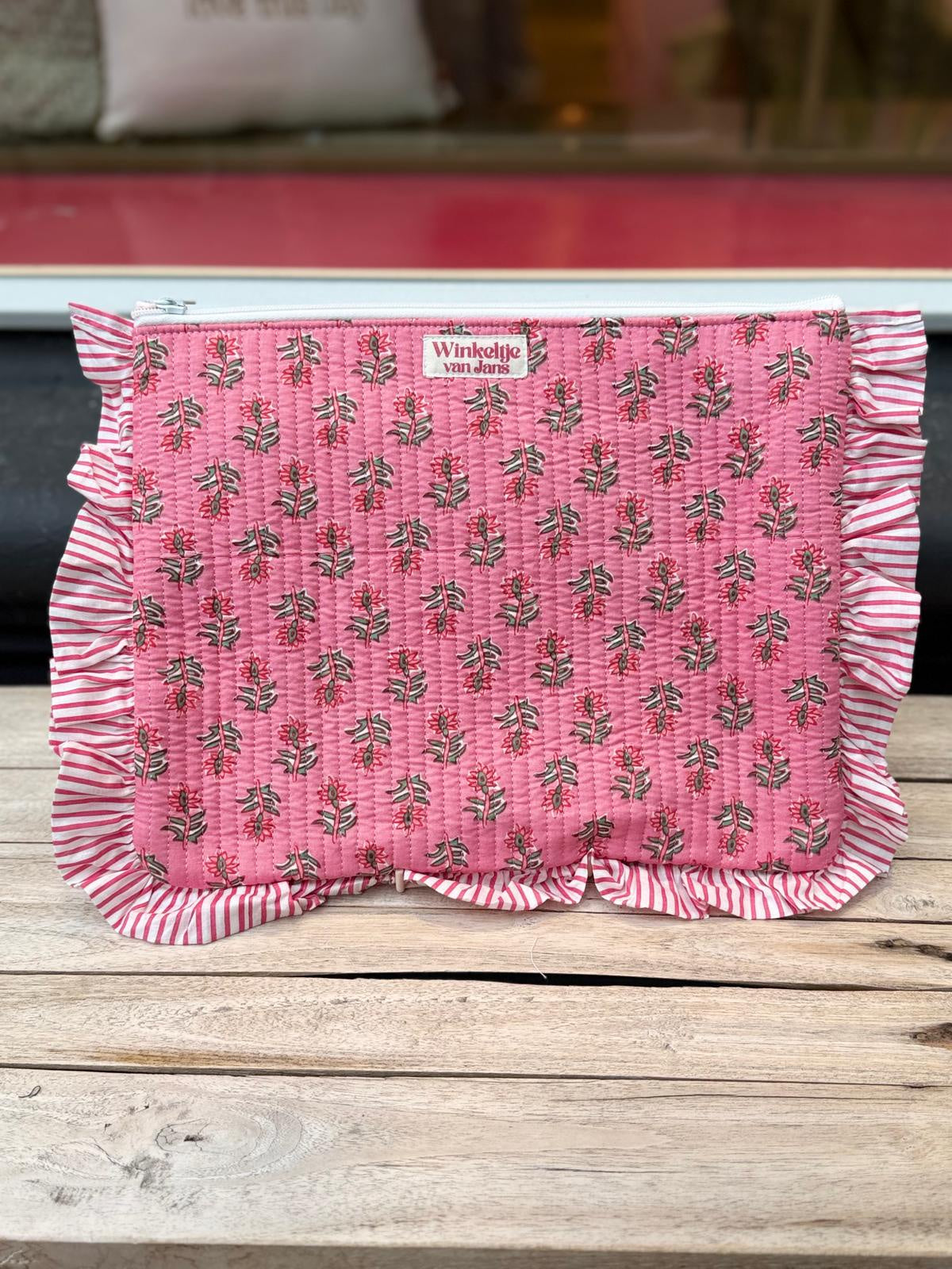 Laptophoes roze bloemen groene blaadjes