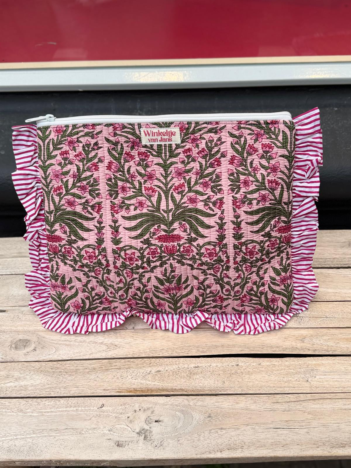 Laptophoes fel roze bloemen met groen