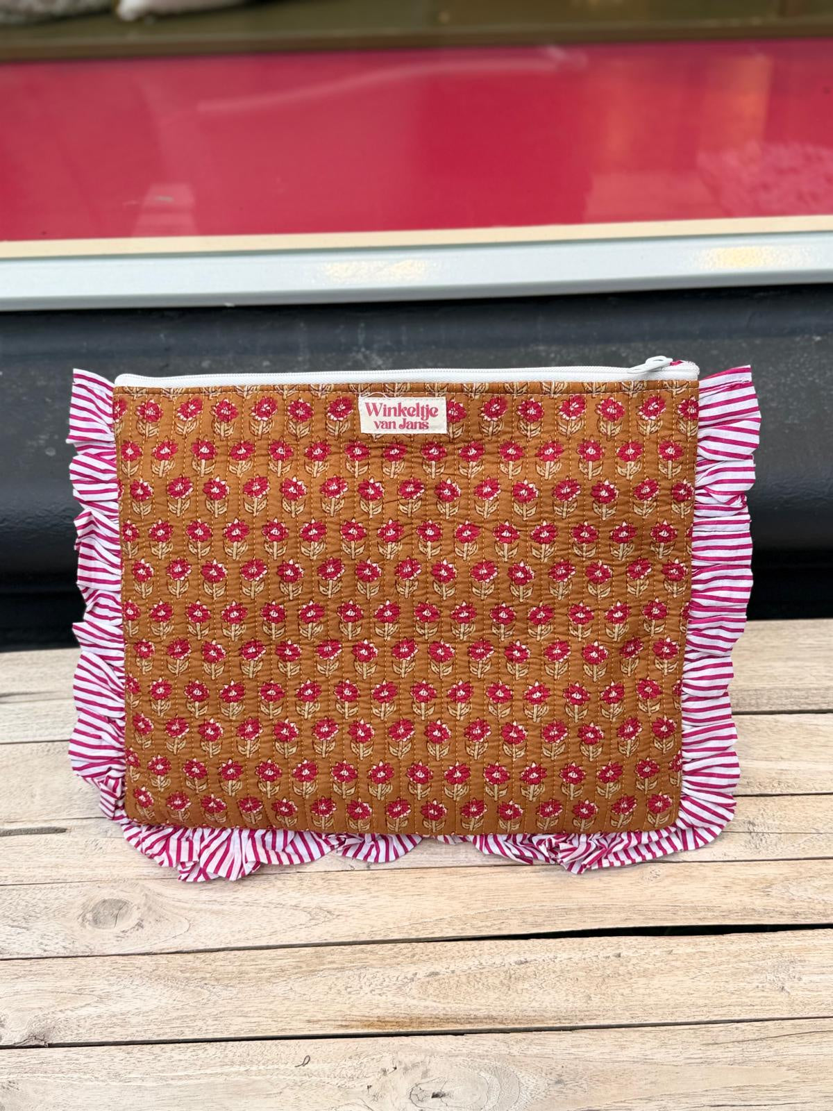 Laptophoes oker geel
