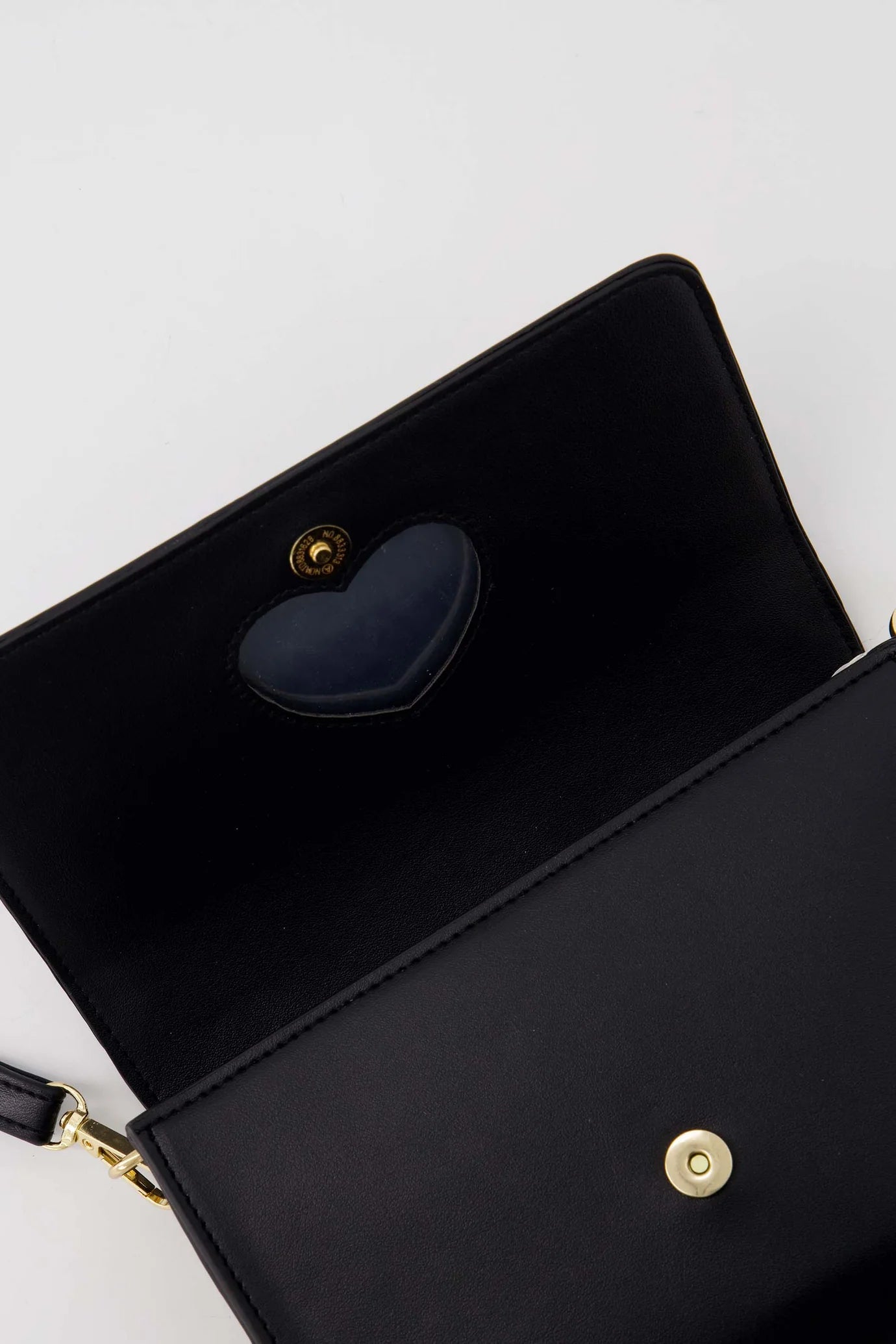 Zusss clutch met hart spiegel