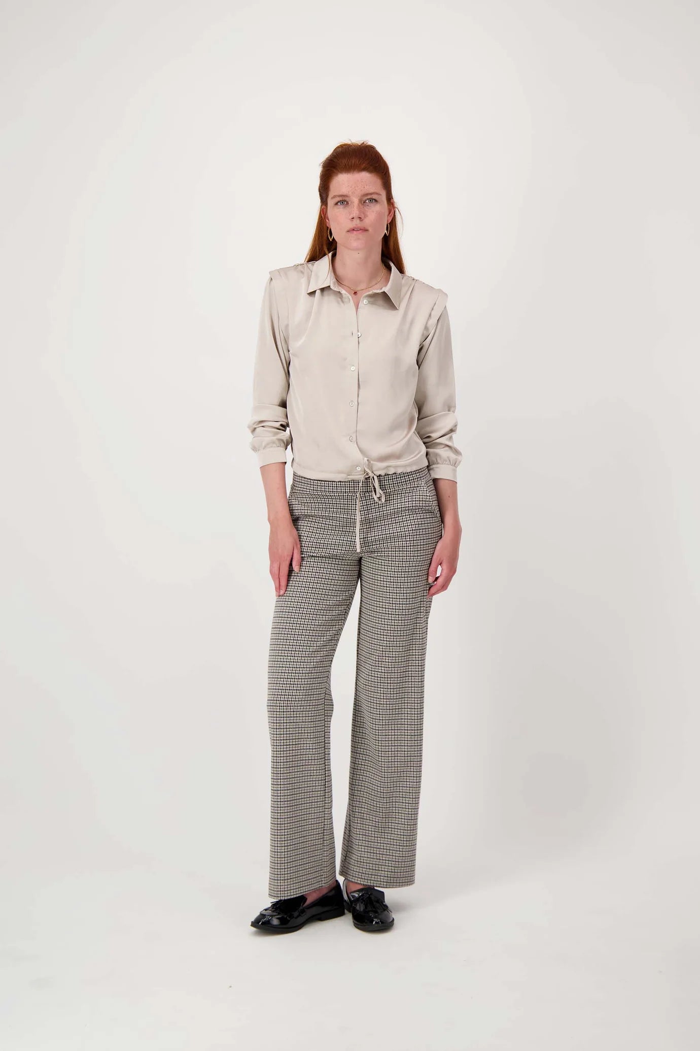 Zusss geruite lange broek.